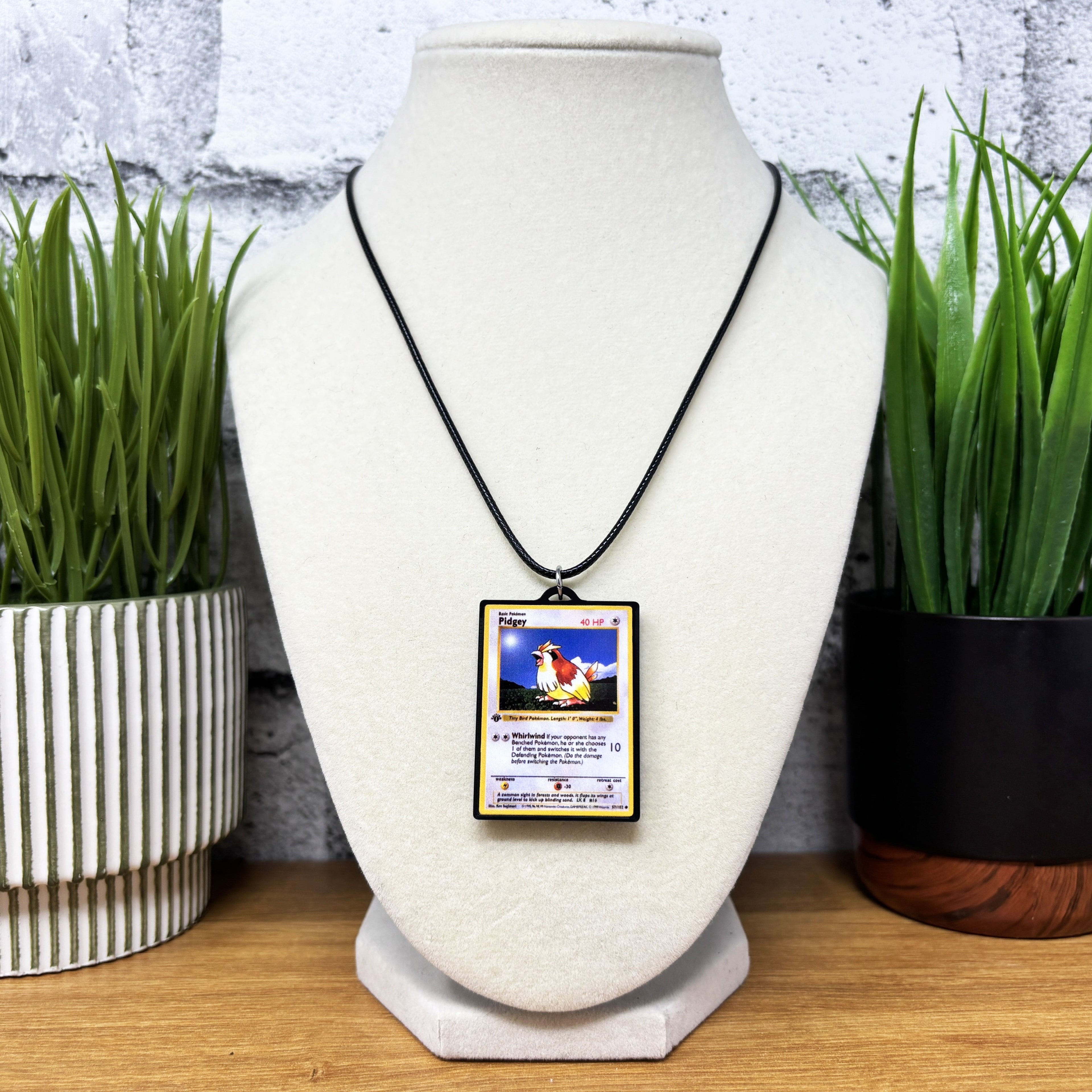 charizard pokemon card necklace Pokemon Card Necklaces (1-50) 6. Charizard