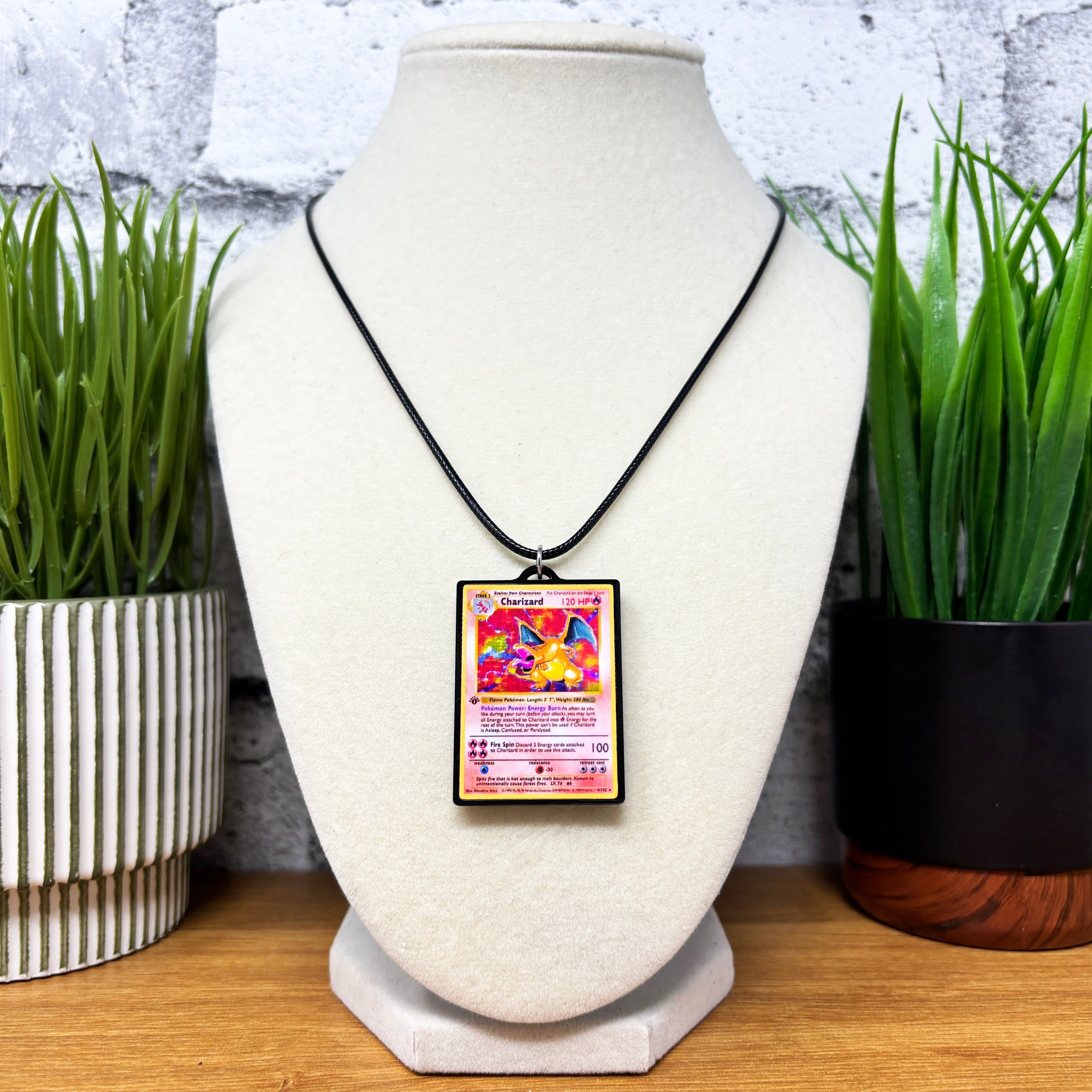 charizard pokemon card necklace Pokemon Card Necklaces (1-50) 6. Charizard
