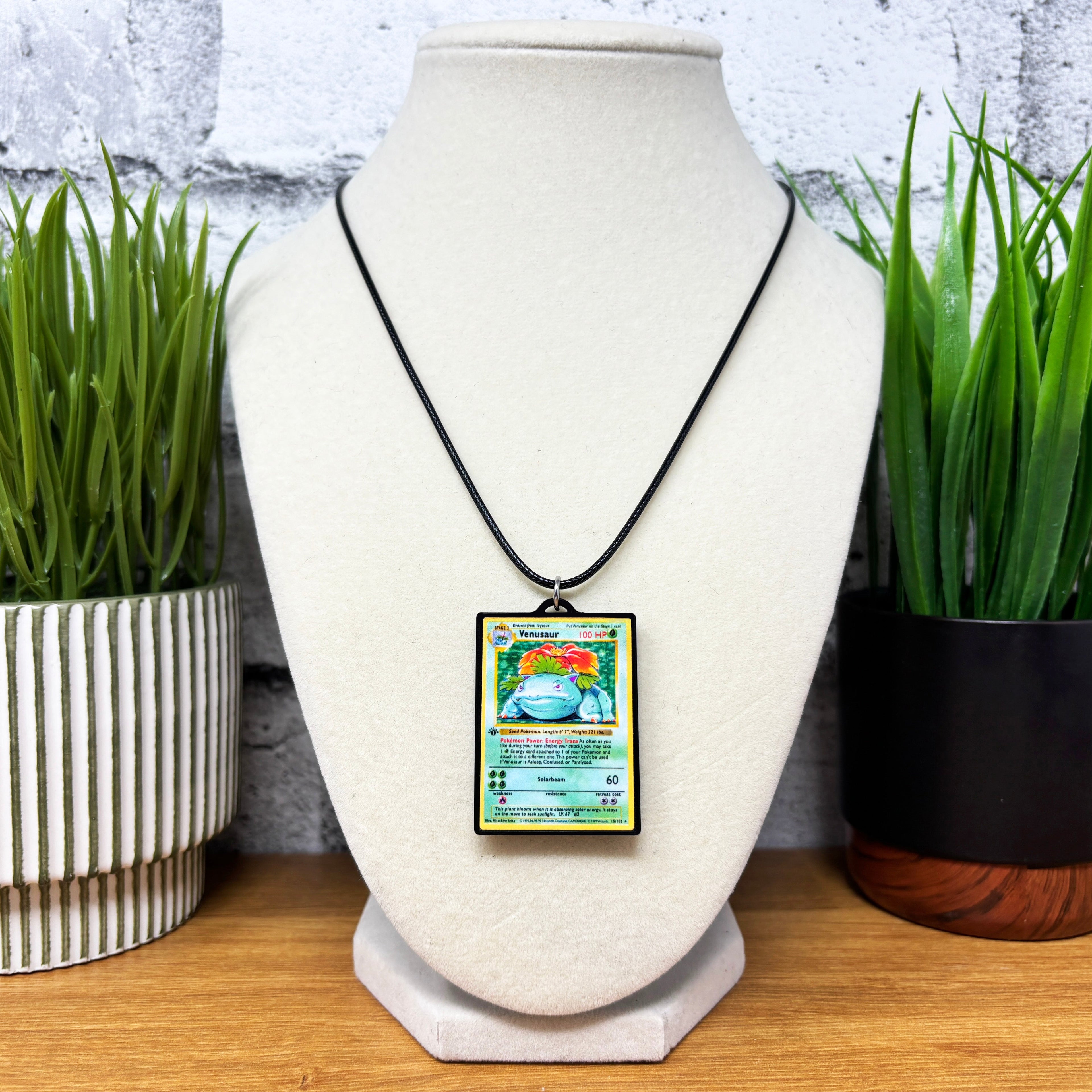pokemon card necklace Pokemon Card Necklaces (1-50) 6. Charizard